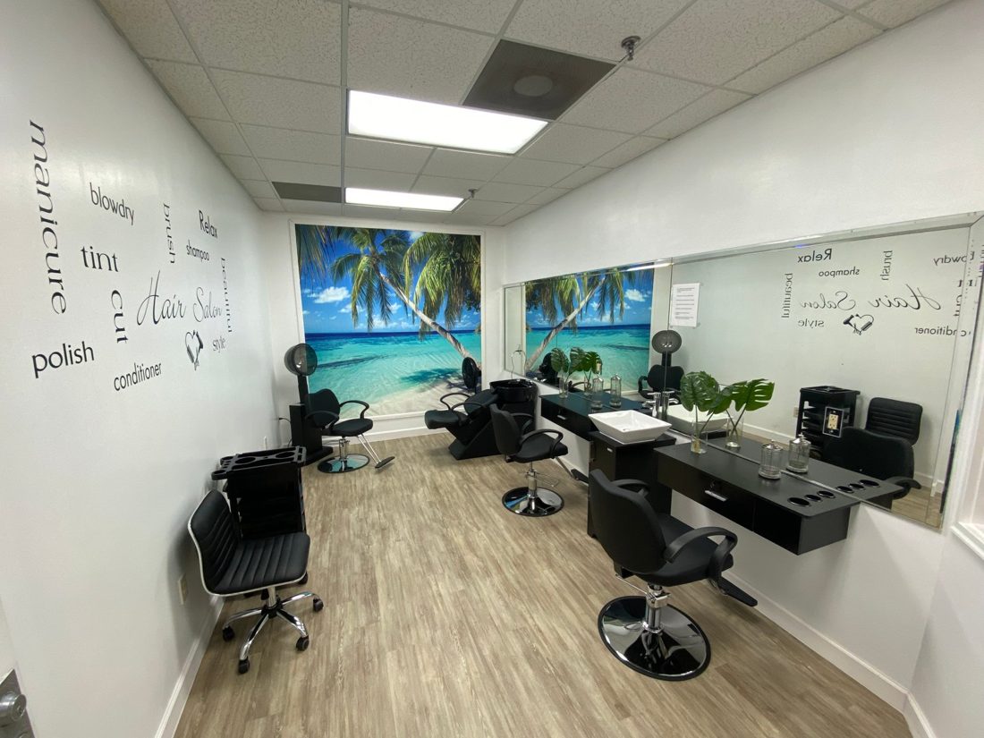 On-site beauty salon with styling chairs and mirrors at Sunny Hills in Homestead